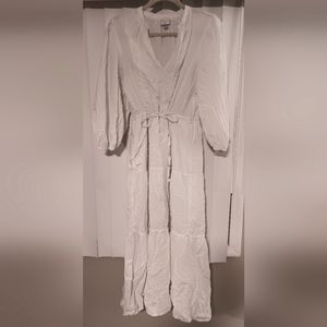 Flowing white summer dress with sleeves